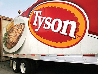 FILE - In this 2009 photo, a Tyson Foods truck is parked at a food warehouse in Little Rock. (AP Photo/Danny Johnston, File)